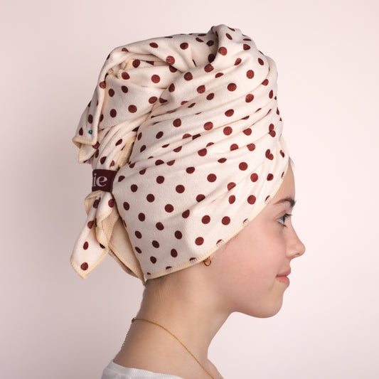Side profile of Junie fast-drying hair towel for fine hair that needs gentle drying, featuring a secure wrap design that gently dries hair faster without friction or damage.