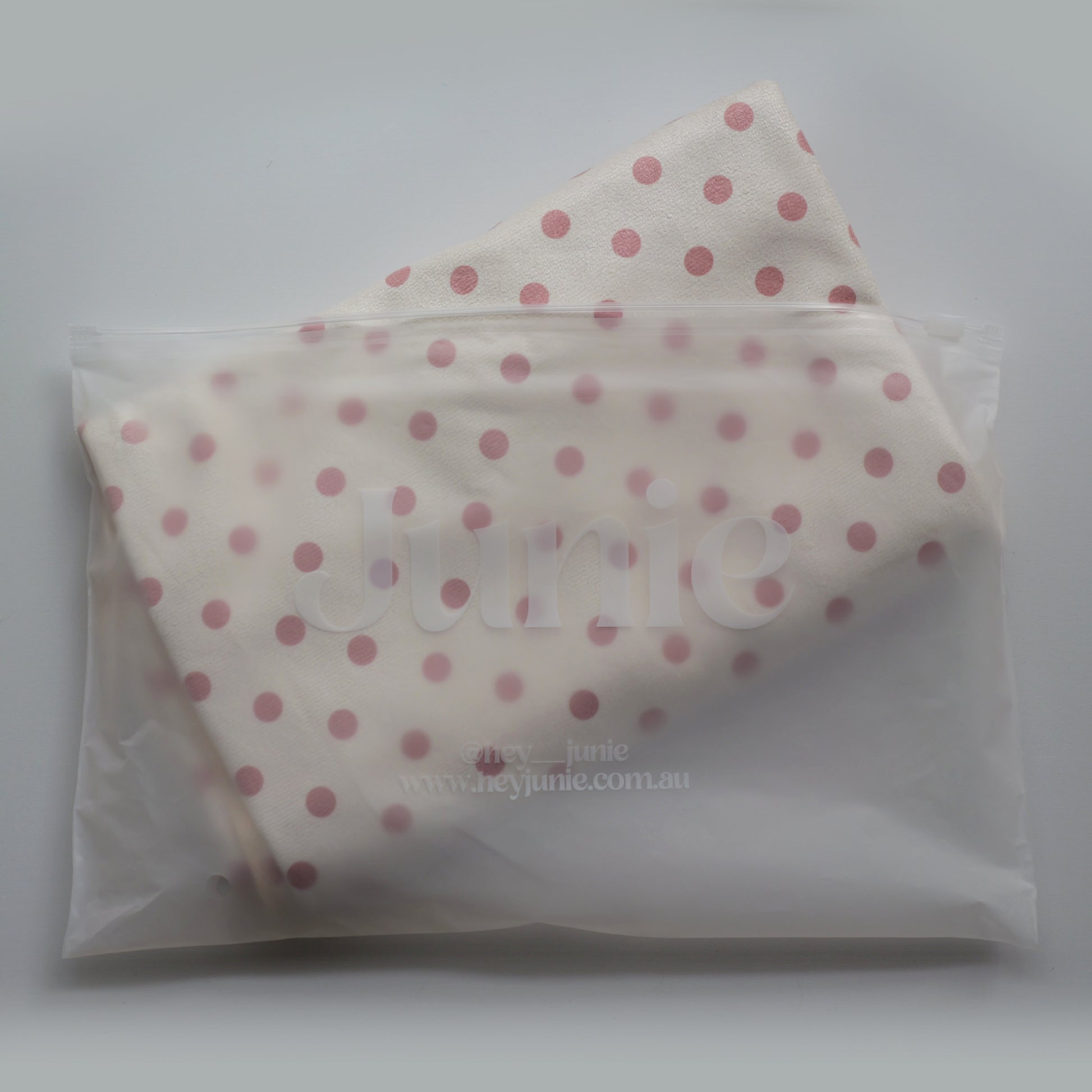 Polka dot Junie quick dry hair towel in peaches and cream colour way in a clear zip lock packaging on a white background